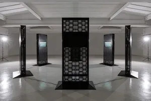 Ominous dark sculptures standing beside each other