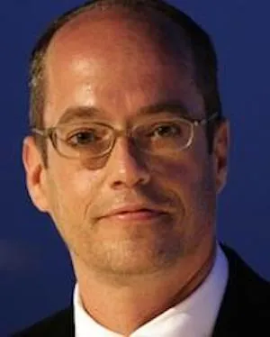 portrait of a white man with glasses