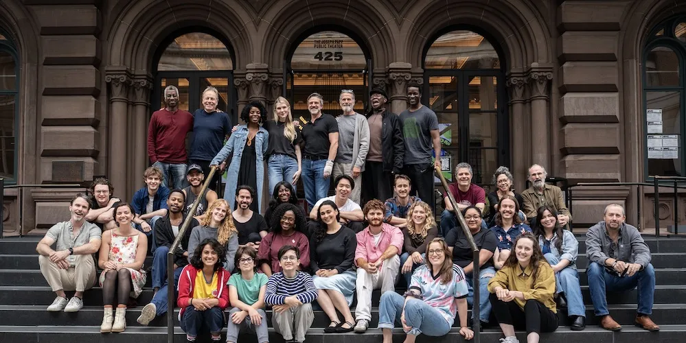 Company members of Free Shakespeare in the Park’s “The Winter’s Tale” pose on the steps of the Public Theater.