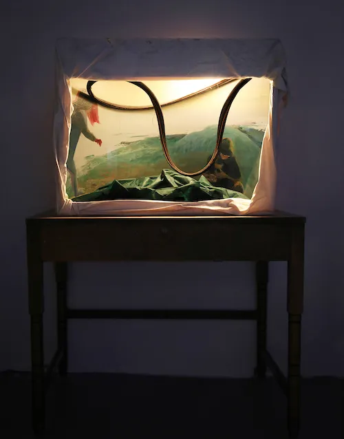 'Library,' 2019, vinyl tiles, fluorescent light, ceramic cow, shoes, receipt rolls, leaves, hair tie, post-it note wood structure, 38x17.5x12in, by Yifan Jiang.