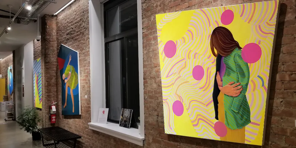 Paintings on the gallery wall. 