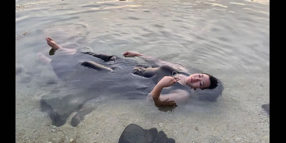 A woman floating on the water