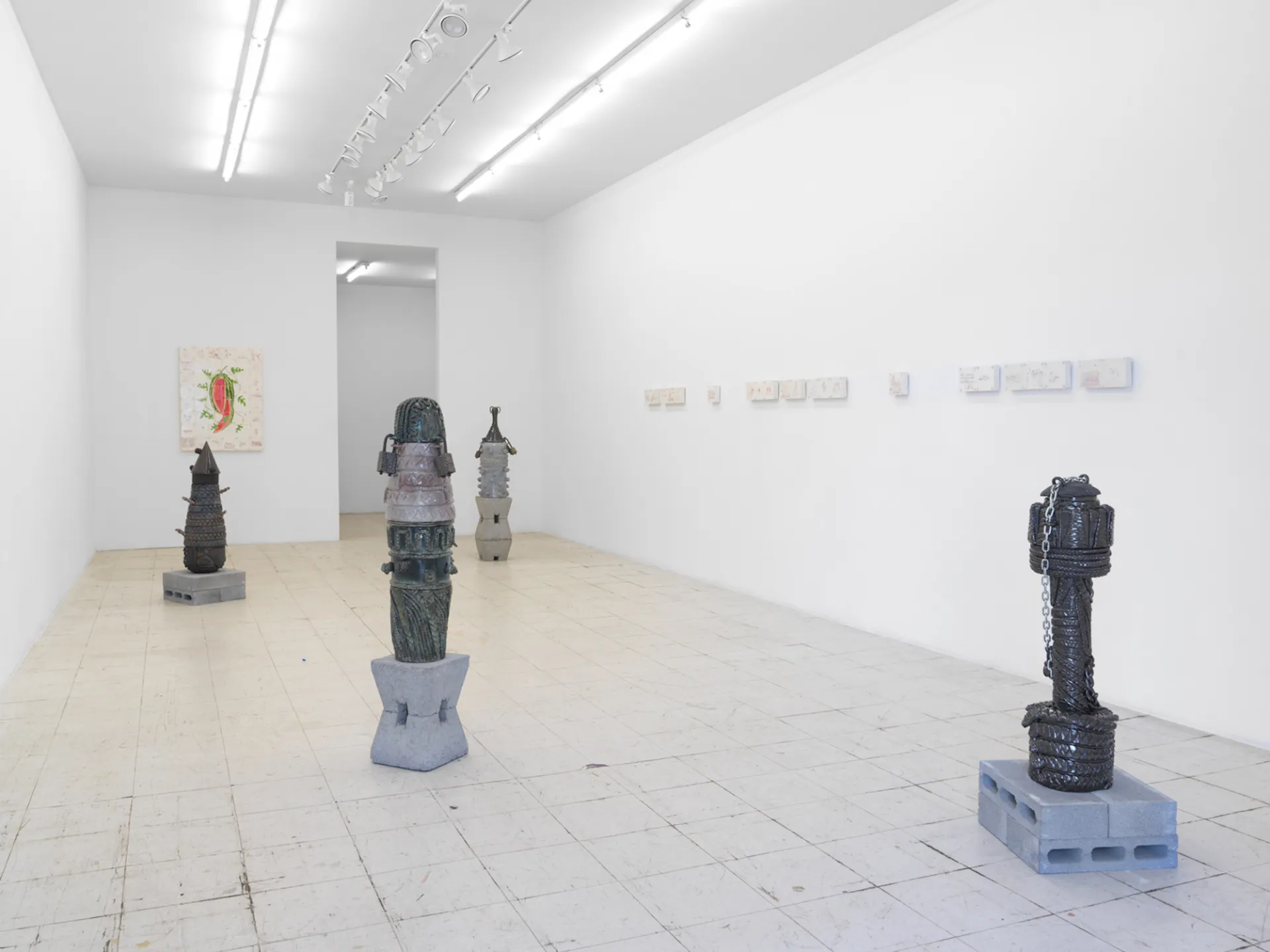 Sculptures in a gallery setting
