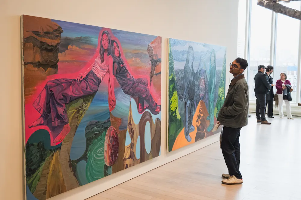 people look at art in a gallery