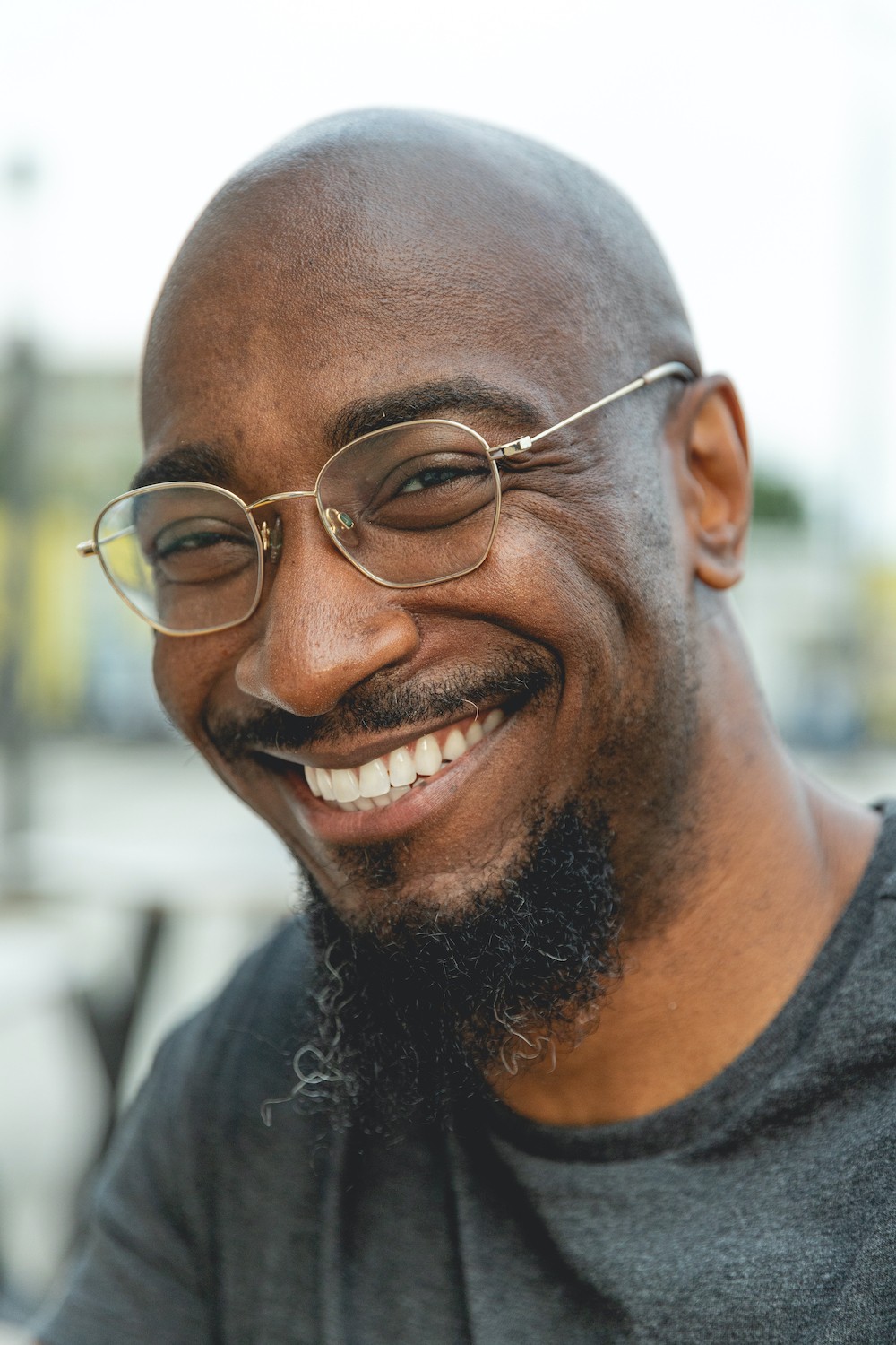 poet phillip b williams - african american man wearing glasses smiling at camera