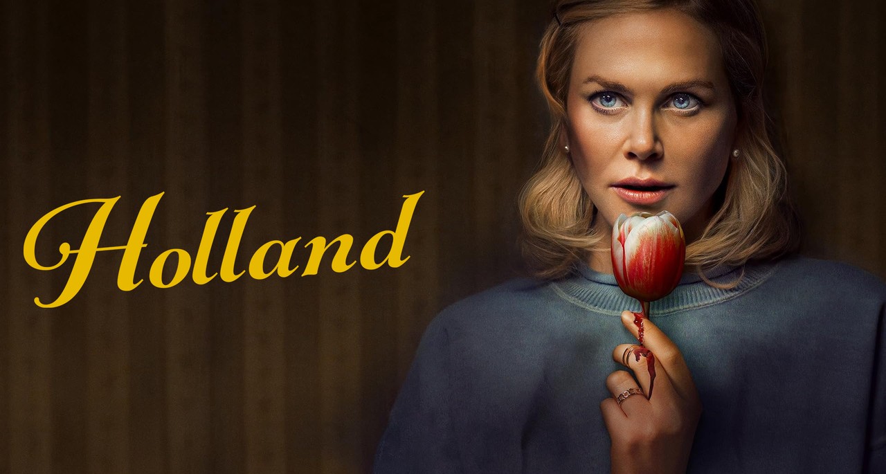a woman holds a bloody tulip