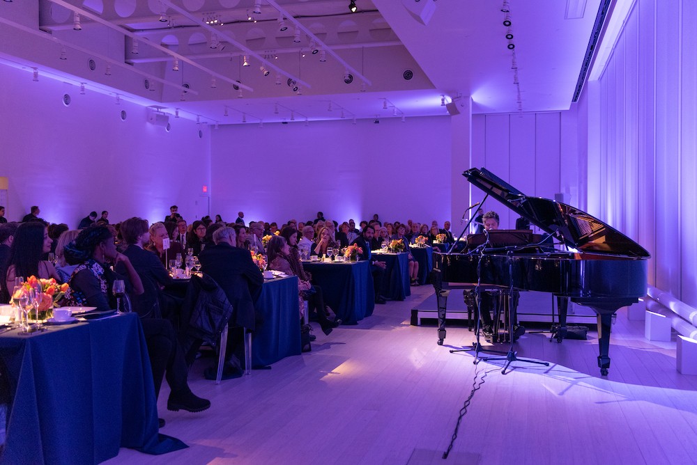 A man performs at a piano
