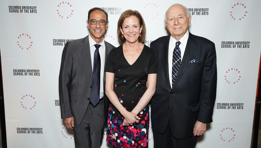 Left to right: Co-chair Hal Luftig, Event Chair Barbara Whitman, Honoree Paul Libin 3 people pose in front of a step & repeat