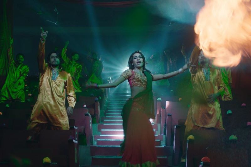 Woman dancing in Bollywood scene