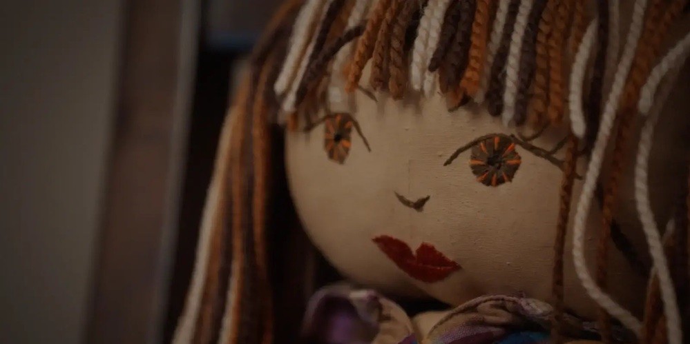 Close up of a rag doll's face