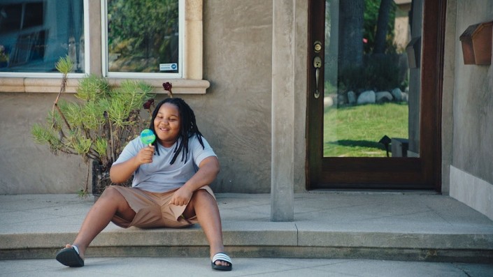 Still from Turtle, written and directed by alumnus Matt Kenchington '13 Child with lollipop