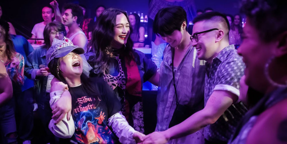 People dancing together. 