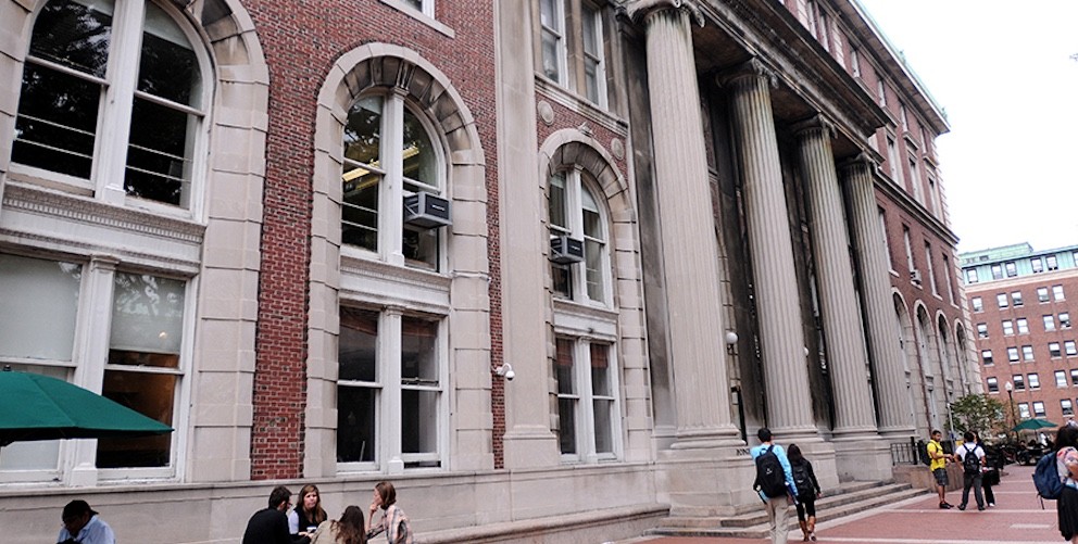 A building with large windows and columns 