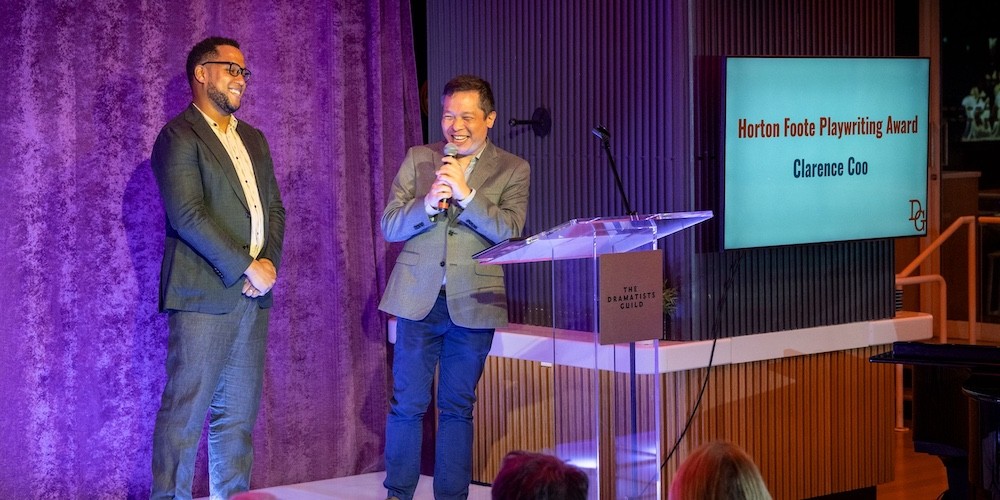 Clarence Coo accepts the 2025 Dramatists Guild Horton Foote Award