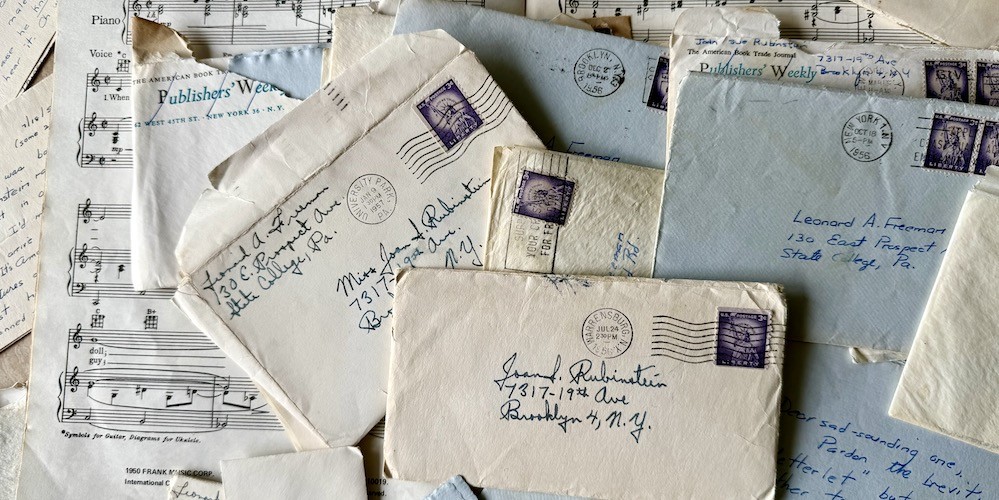 Pile of handwritten letters and envelopes. 