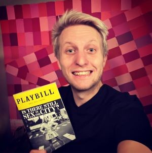 Student Robbie Armstrong person holding playbill