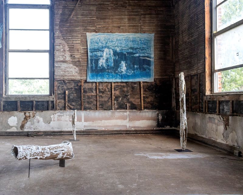 Installation of paper sculptures and cyanotype painting on silk in Yonkers