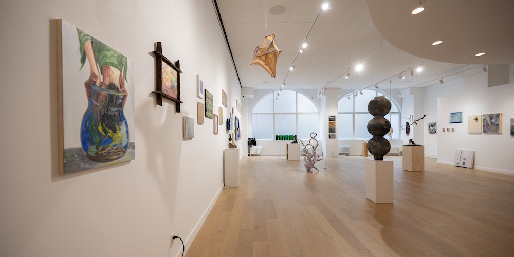 Exhibition space filled with artwork