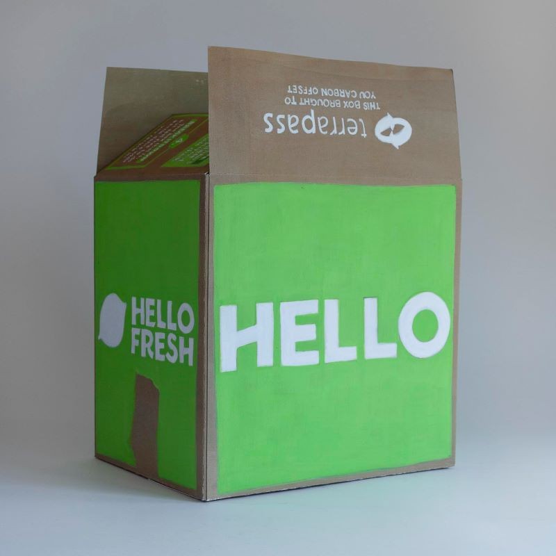 Sculpture of green cardboard box