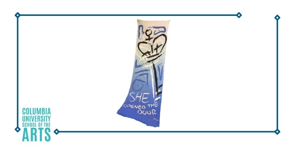 Blue and off-white scarf with design and text reading 'She opened the door'