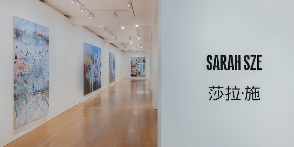 Painting display on a gallery wall. 