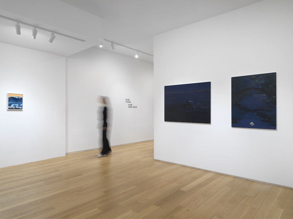 Paintings hand in a gallery.