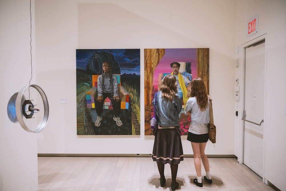 People view art work.