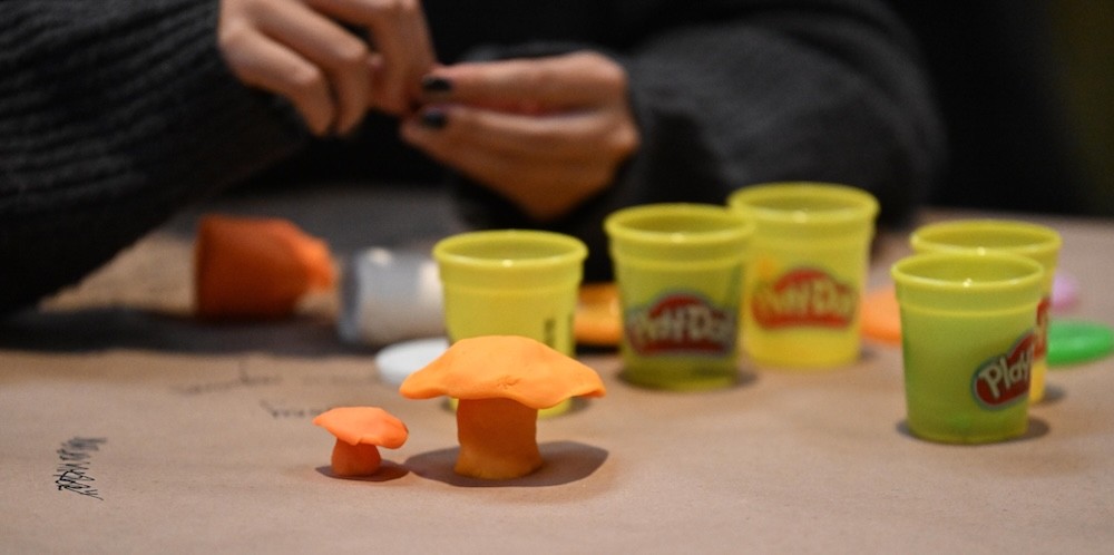 Containers of Play Doh. 