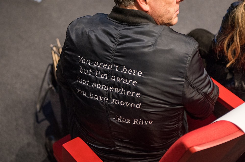 Man with max Ritvo poem on jacket