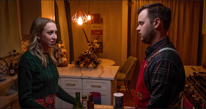 still from 'Feed Me' A couple talking indoors