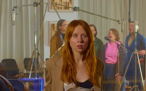 'Proto,' by Holly Herndon Poster with the concerned look of a red head with long hair