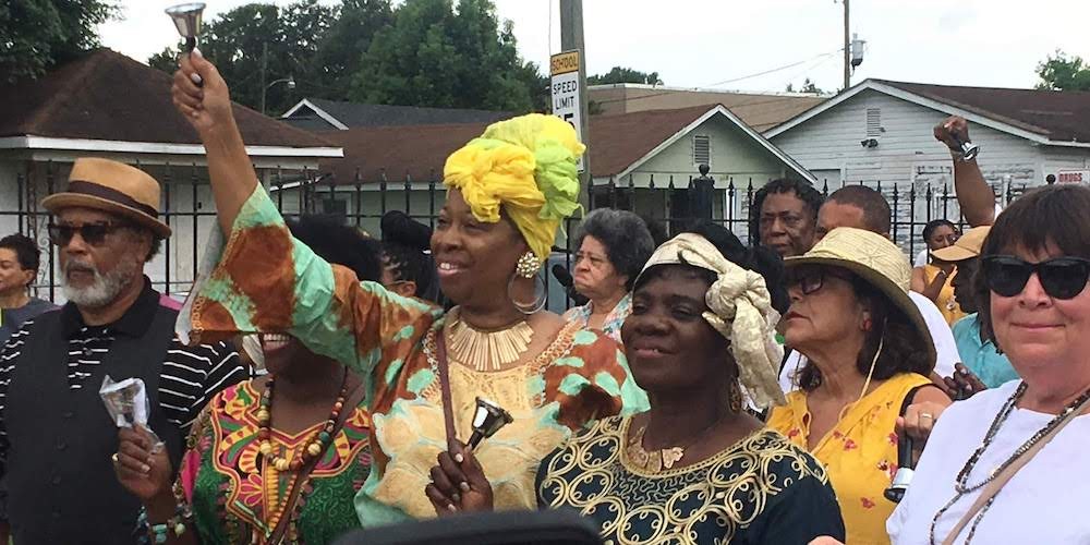 Members of the Africatown community celebrate the legacy of the Clotilda ship at a bell ringing ceremony in August 2019.
